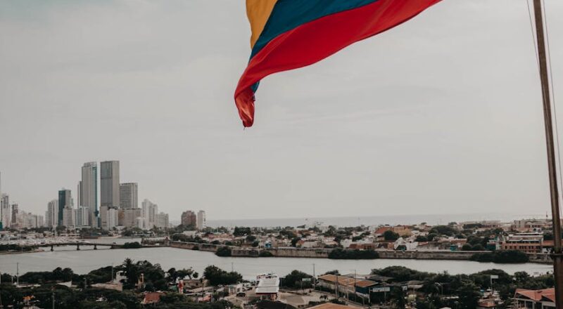 urban waterfront and a colombian flag on a wind